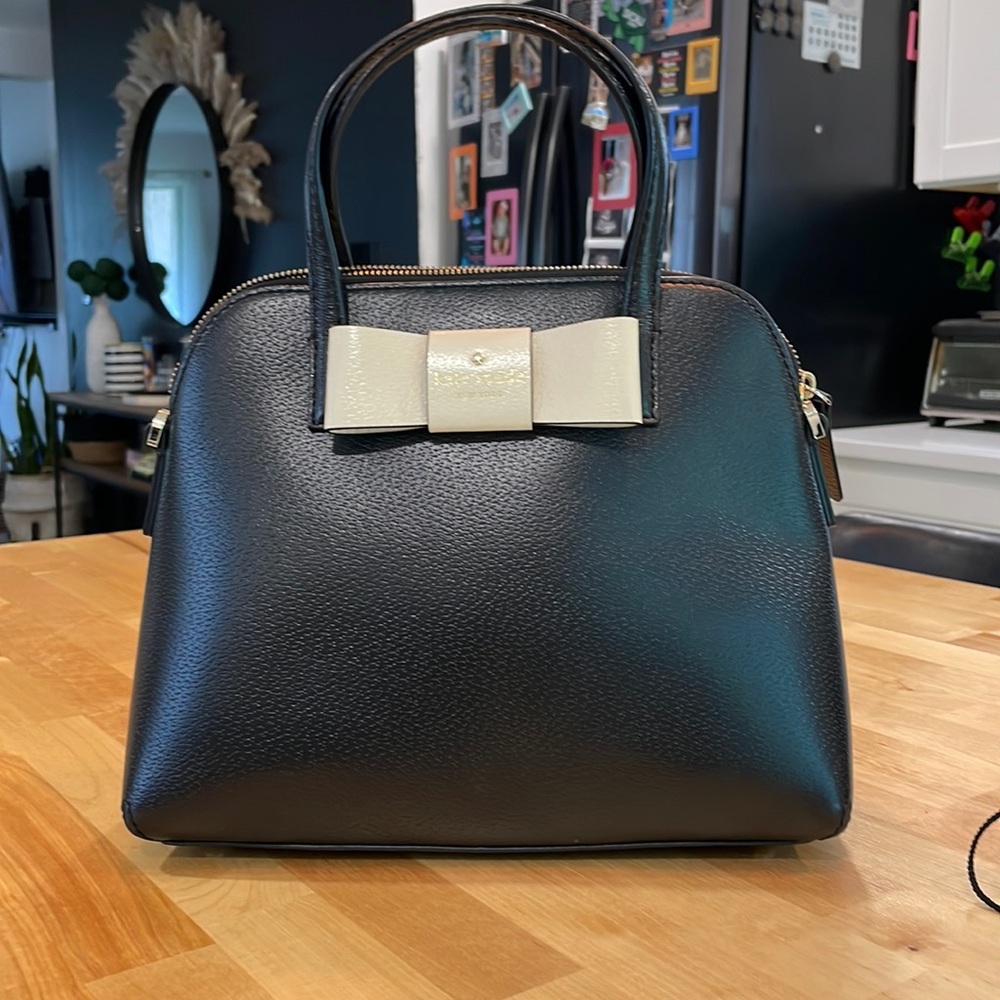 Kate Spade black handbag with pink bow